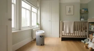 Quiet air purifier with a child lock feature running in a child's nursery to help reduce hay fever and dust allergens.