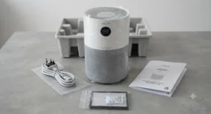 Unboxed value H13 HEPA air purifier unit shown alongside its power cable and instruction booklet.